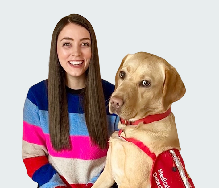 Sophie Jackson and her medical alert assistance dog, Tashi.